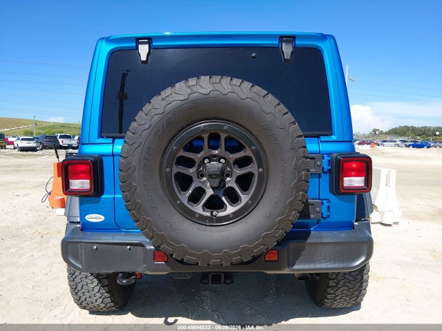 Auction sale of the 2023 Jeep Wrangler 4-door High Tide 4x4, vin: 1C4HJXDG6PW673219, lot number: 45996523