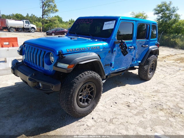 Auction sale of the 2023 Jeep Wrangler 4-door High Tide 4x4, vin: 1C4HJXDG6PW673219, lot number: 45996523