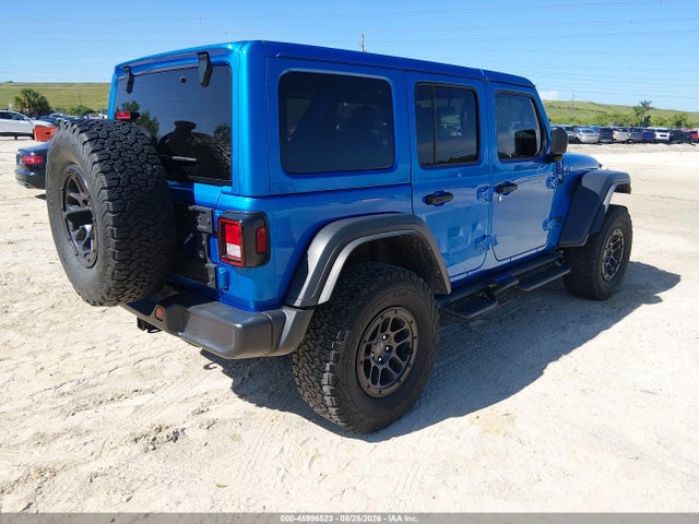 Auction sale of the 2023 Jeep Wrangler 4-door High Tide 4x4, vin: 1C4HJXDG6PW673219, lot number: 45996523