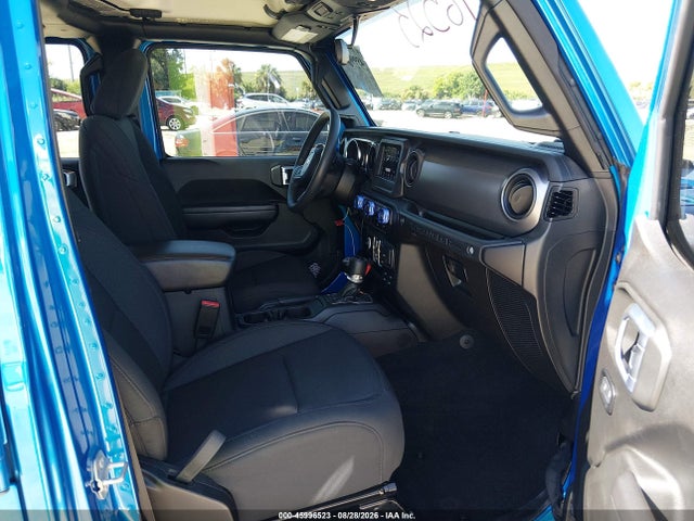 Auction sale of the 2023 Jeep Wrangler 4-door High Tide 4x4, vin: 1C4HJXDG6PW673219, lot number: 45996523