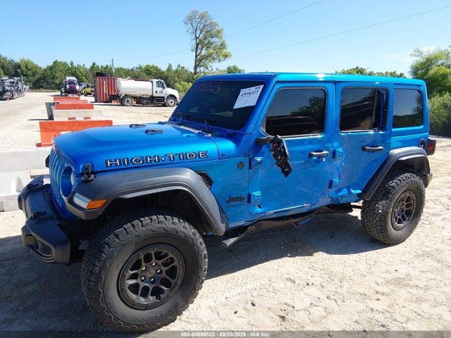 Auction sale of the 2023 Jeep Wrangler 4-door High Tide 4x4, vin: 1C4HJXDG6PW673219, lot number: 45996523