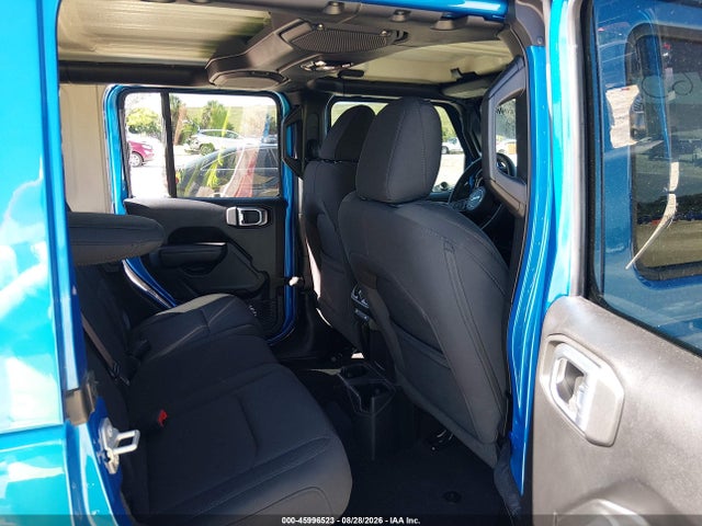 Auction sale of the 2023 Jeep Wrangler 4-door High Tide 4x4, vin: 1C4HJXDG6PW673219, lot number: 45996523