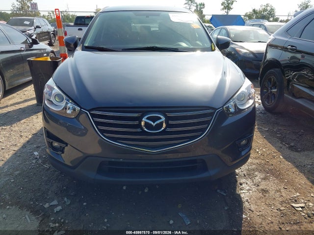 2016 Mazda Cx-5 Touring მანქანა იყიდება აუქციონზე, vin: JM3KE4CY9G0846227, აუქციონის ნომერი: 45997570