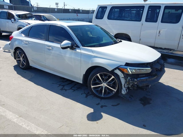 Auction sale of the 2023 Honda Civic Touring, vin: 2HGFE1F91PH310303, lot number: 46012593