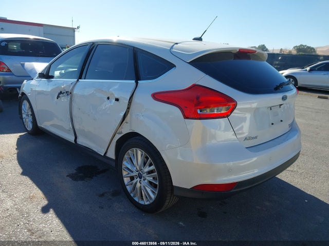 Продаж на аукціоні авто 2015 Ford Focus Titanium, vin: 1FADP3N20FL339556, номер лоту: 46013956
