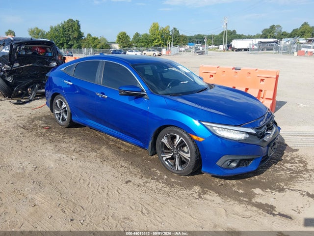 2016 2HGFC1F99GH638011 main image