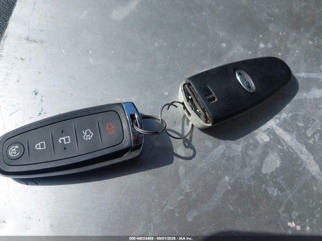 1FMCU0JX7EUB72566 Ford Escape Titanium