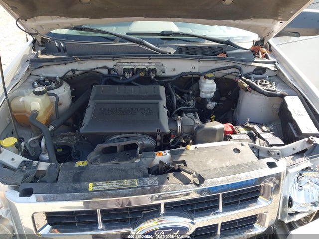46024580 :رقم المزاد ، 1FMCU93G79KC80950 vin ، 2009 Ford Escape Xlt مزاد بيع