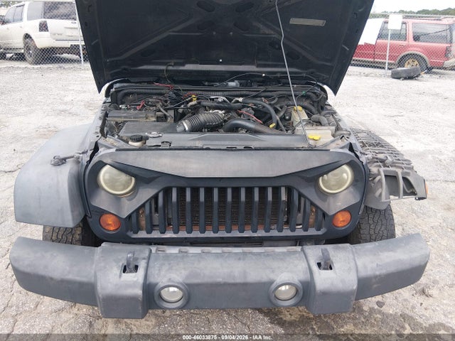 46033875 :رقم المزاد ، 1J4BB3H14AL214467 vin ، 2010 Jeep Wrangler Unlimited Sport مزاد بيع