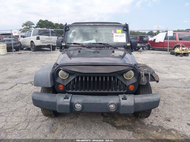 46033875 :رقم المزاد ، 1J4BB3H14AL214467 vin ، 2010 Jeep Wrangler Unlimited Sport مزاد بيع