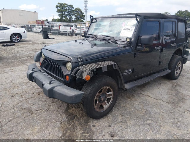46033875 :رقم المزاد ، 1J4BB3H14AL214467 vin ، 2010 Jeep Wrangler Unlimited Sport مزاد بيع