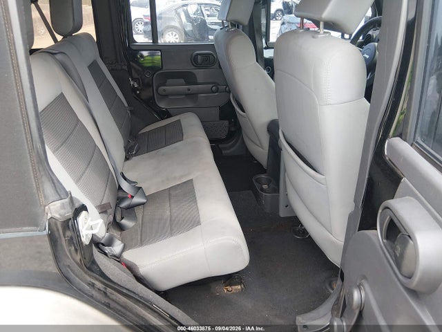 46033875 :رقم المزاد ، 1J4BB3H14AL214467 vin ، 2010 Jeep Wrangler Unlimited Sport مزاد بيع