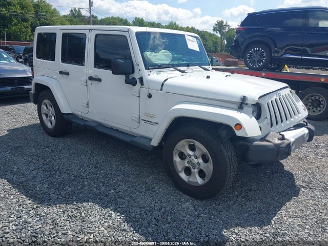 2014 Jeep Wrangler Unlimited Sahara მანქანა იყიდება აუქციონზე, vin: 1C4BJWEG7EL104537, აუქციონის ნომერი: 46044691