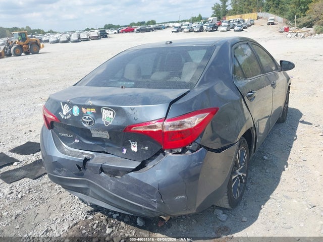 46051516 :رقم المزاد ، 5YFBURHE9JP834700 vin ، 2018 Toyota Corolla Le مزاد بيع