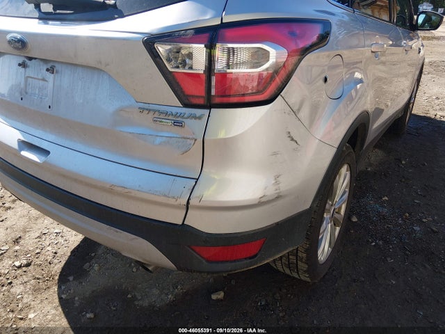 Продажа на аукционе авто 2017 Ford Escape Titanium, vin: 1FMCU9J9XHUE11487, номер лота: 46055391