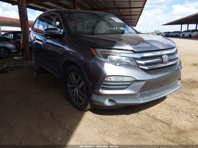 Продажа на аукционе авто 2017 Honda Pilot Touring, vin: 5FNYF5H97HB004027, номер лота: 46059070