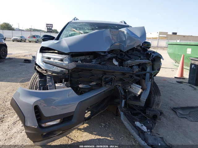 5FNYF8H09NB002388 Honda Passport Awd Elite