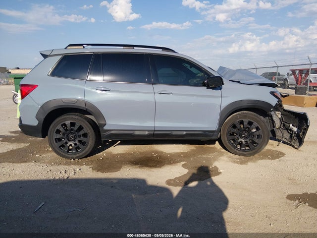5FNYF8H09NB002388 Honda Passport Awd Elite