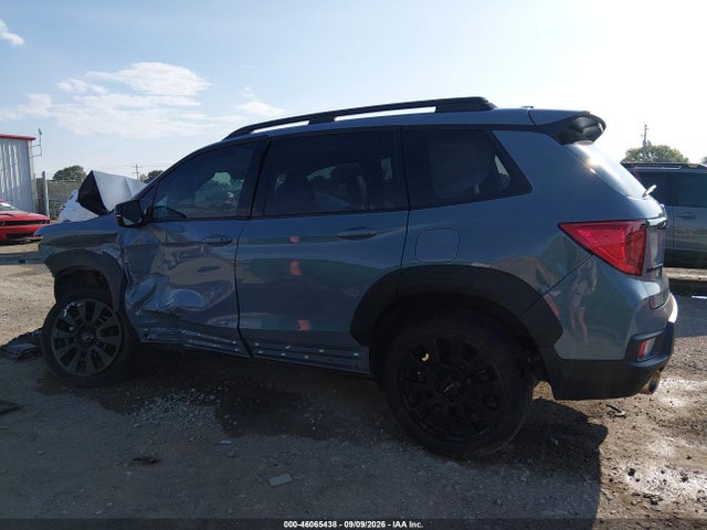 5FNYF8H09NB002388 Honda Passport Awd Elite
