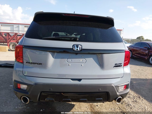 5FNYF8H09NB002388 Honda Passport Awd Elite