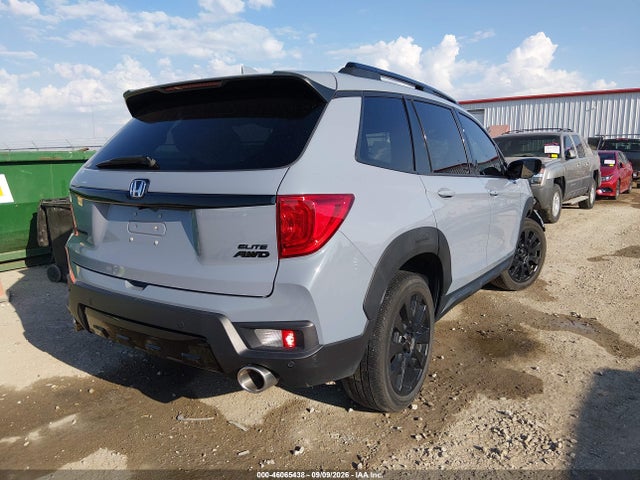 5FNYF8H09NB002388 Honda Passport Awd Elite