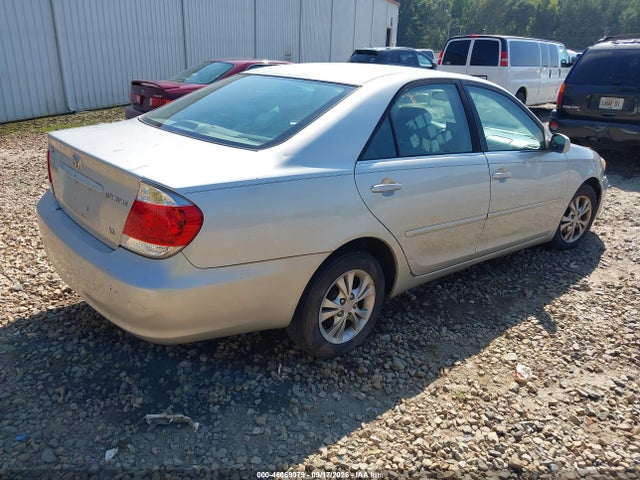 46069079 :رقم المزاد ، 4T1BF32KX5U594261 vin ، 2005 Toyota Camry Le V6 مزاد بيع
