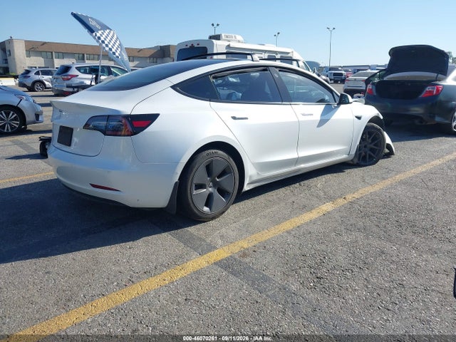Tesla Model 3 Standard Range Plus Rear-wheel Drive 2021 5YJ3E1EA3MF874145 Image 4
