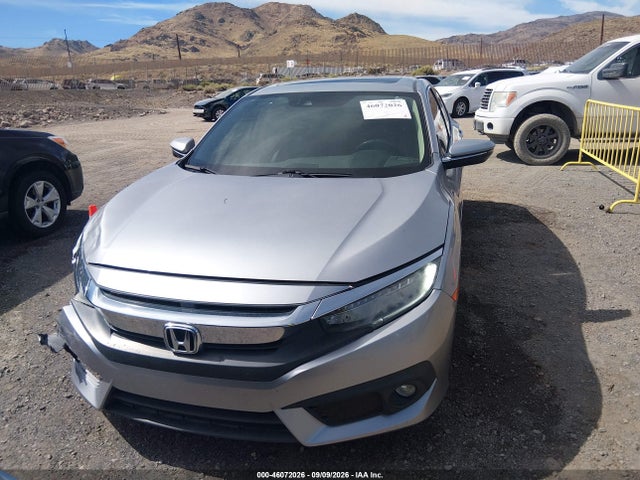 46072026 :رقم المزاد ، 19XFC1F94GE007838 vin ، 2016 Honda Civic Touring مزاد بيع