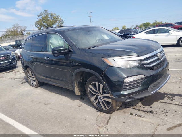 Продаж на аукціоні авто 2017 Honda Pilot Touring, vin: 5FNYF6H95HB035797, номер лоту: 46073024