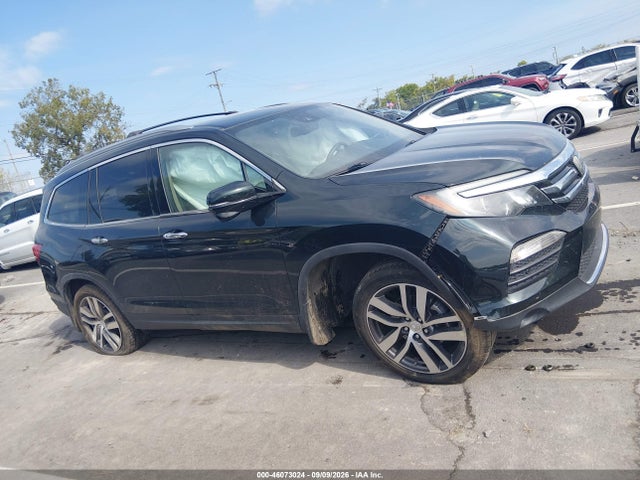 Продаж на аукціоні авто 2017 Honda Pilot Touring, vin: 5FNYF6H95HB035797, номер лоту: 46073024