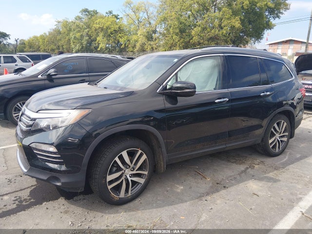 Продаж на аукціоні авто 2017 Honda Pilot Touring, vin: 5FNYF6H95HB035797, номер лоту: 46073024