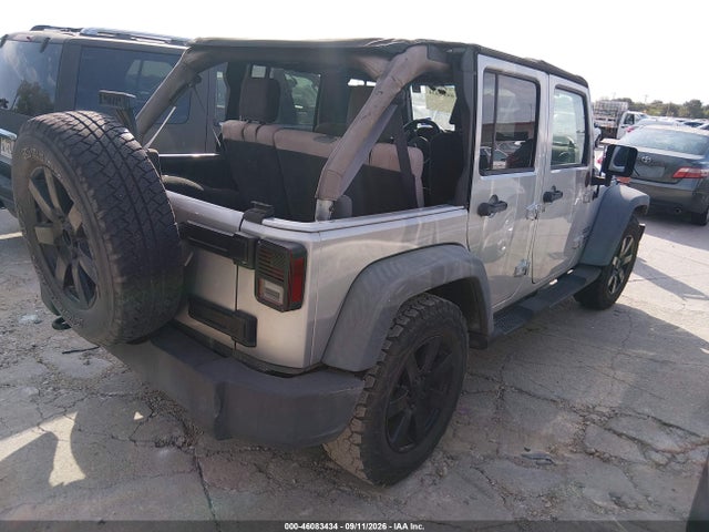 46083434 :رقم المزاد ، 1J4BB3H17AL130885 vin ، 2010 Jeep Wrangler Unlimited Sport مزاد بيع
