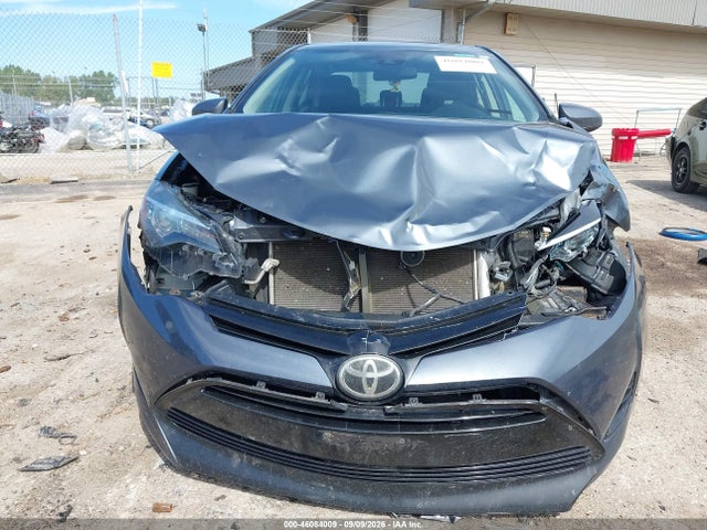 46084009 :رقم المزاد ، 5YFBURHE4JP841585 vin ، 2018 Toyota Corolla Le مزاد بيع