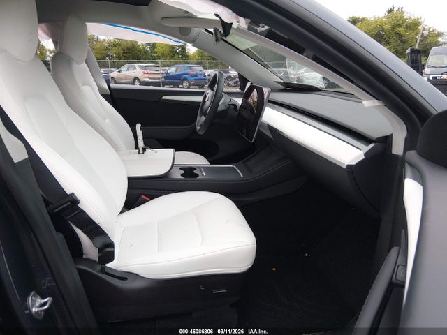 Продаж на аукціоні авто 2023 Tesla Model Y Awd/long Range Dual Motor All-wheel Drive, vin: 7SAYGDEE9PF597576, номер лоту: 46086806