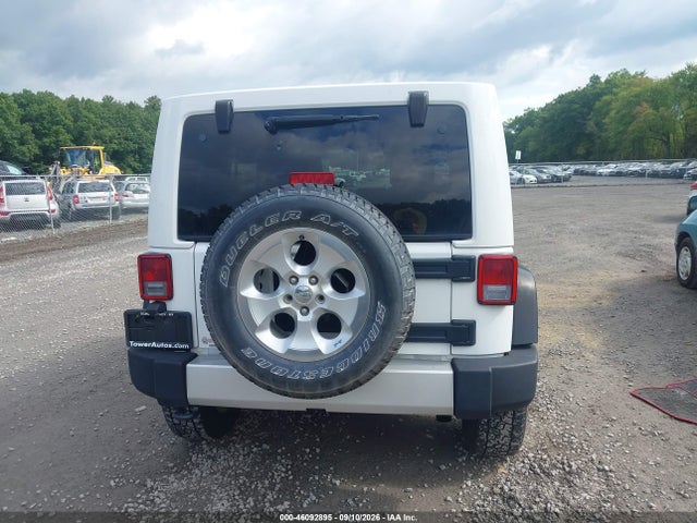 2014 Jeep Wrangler Unlimited Sahara მანქანა იყიდება აუქციონზე, vin: 1C4HJWEG5EL262076, აუქციონის ნომერი: 46092895