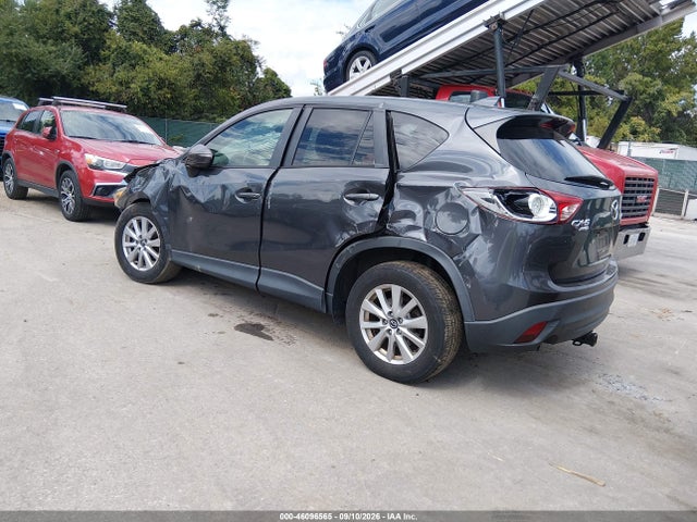 2016 Mazda Cx-5 Touring მანქანა იყიდება აუქციონზე, vin: JM3KE4CYXG0802429, აუქციონის ნომერი: 46096565