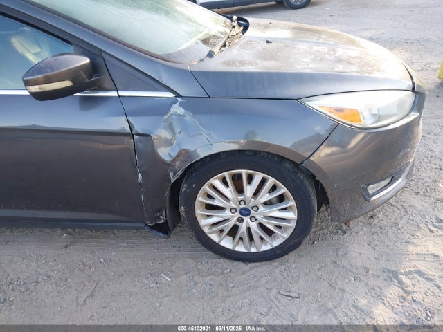 Продажа на аукционе авто 2016 Ford Focus Titanium, vin: 1FADP3J27GL273868, номер лота: 46102021