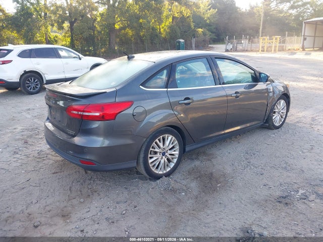 Продажа на аукционе авто 2016 Ford Focus Titanium, vin: 1FADP3J27GL273868, номер лота: 46102021