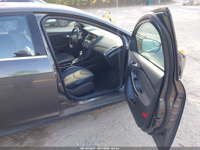 Продажа на аукционе авто 2016 Ford Focus Titanium, vin: 1FADP3J27GL273868, номер лота: 46102021