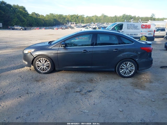 Продажа на аукционе авто 2016 Ford Focus Titanium, vin: 1FADP3J27GL273868, номер лота: 46102021
