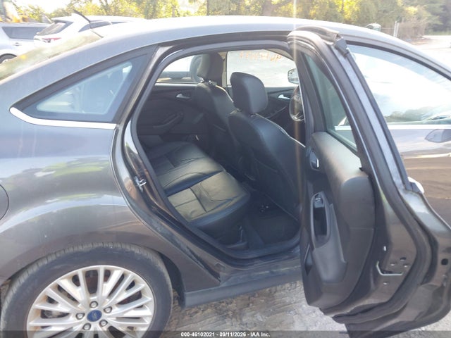 Продажа на аукционе авто 2016 Ford Focus Titanium, vin: 1FADP3J27GL273868, номер лота: 46102021