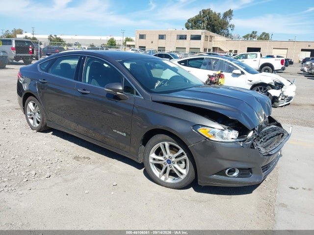 2016 Ford Fusion Hybrid Titanium მანქანა იყიდება აუქციონზე, vin: 3FA6P0RU6GR240374, აუქციონის ნომერი: 46106561