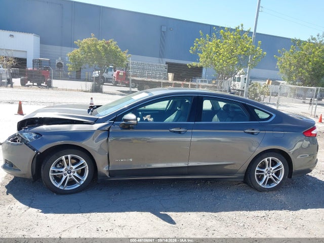 2016 Ford Fusion Hybrid Titanium მანქანა იყიდება აუქციონზე, vin: 3FA6P0RU6GR240374, აუქციონის ნომერი: 46106561
