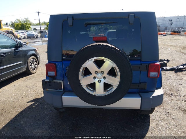46114380 :رقم المزاد ، 1J8FA54159L716890 vin ، 2009 Jeep Wrangler Sahara مزاد بيع