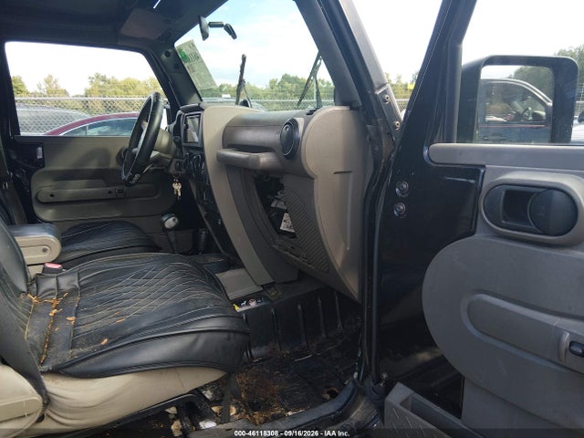Auction sale of the 2008 Jeep Wrangler Unlimited Sahara, vin: 1J4GA59168L600823, lot number: 46118308