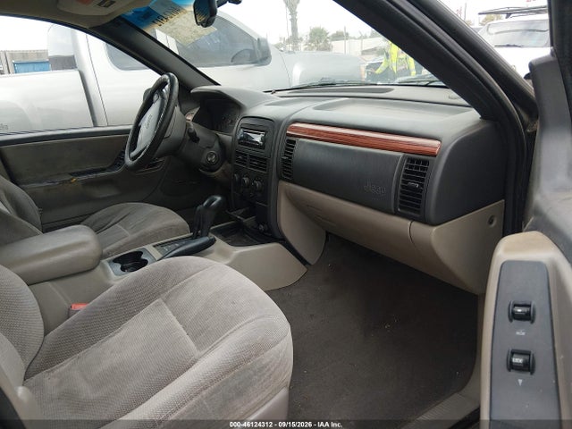 1999 Jeep Grand Cherokee Laredo მანქანა იყიდება აუქციონზე, vin: 1J4GW58S6XC671790, აუქციონის ნომერი: 46124312