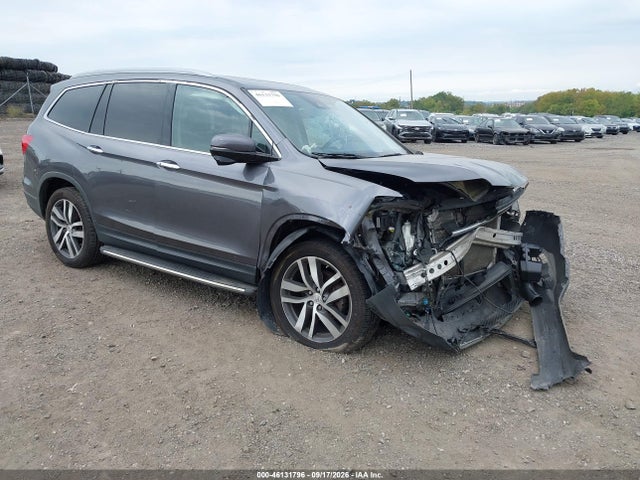 46131796 :رقم المزاد ، 5FNYF6H90HB105058 vin ، 2017 Honda Pilot Touring مزاد بيع