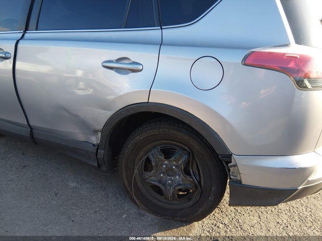 2T3ZFREV7GW293173 Toyota RAV4 LE