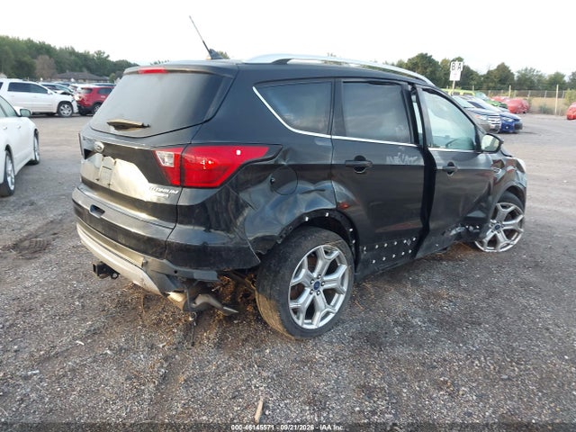 2019 Ford Escape Titanium მანქანა იყიდება აუქციონზე, vin: 1FMCU9J90KUB61474, აუქციონის ნომერი: 46145571