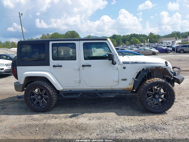 1C4BJWEG9EL200475 Jeep Wrangler Unlimited Polar Edition